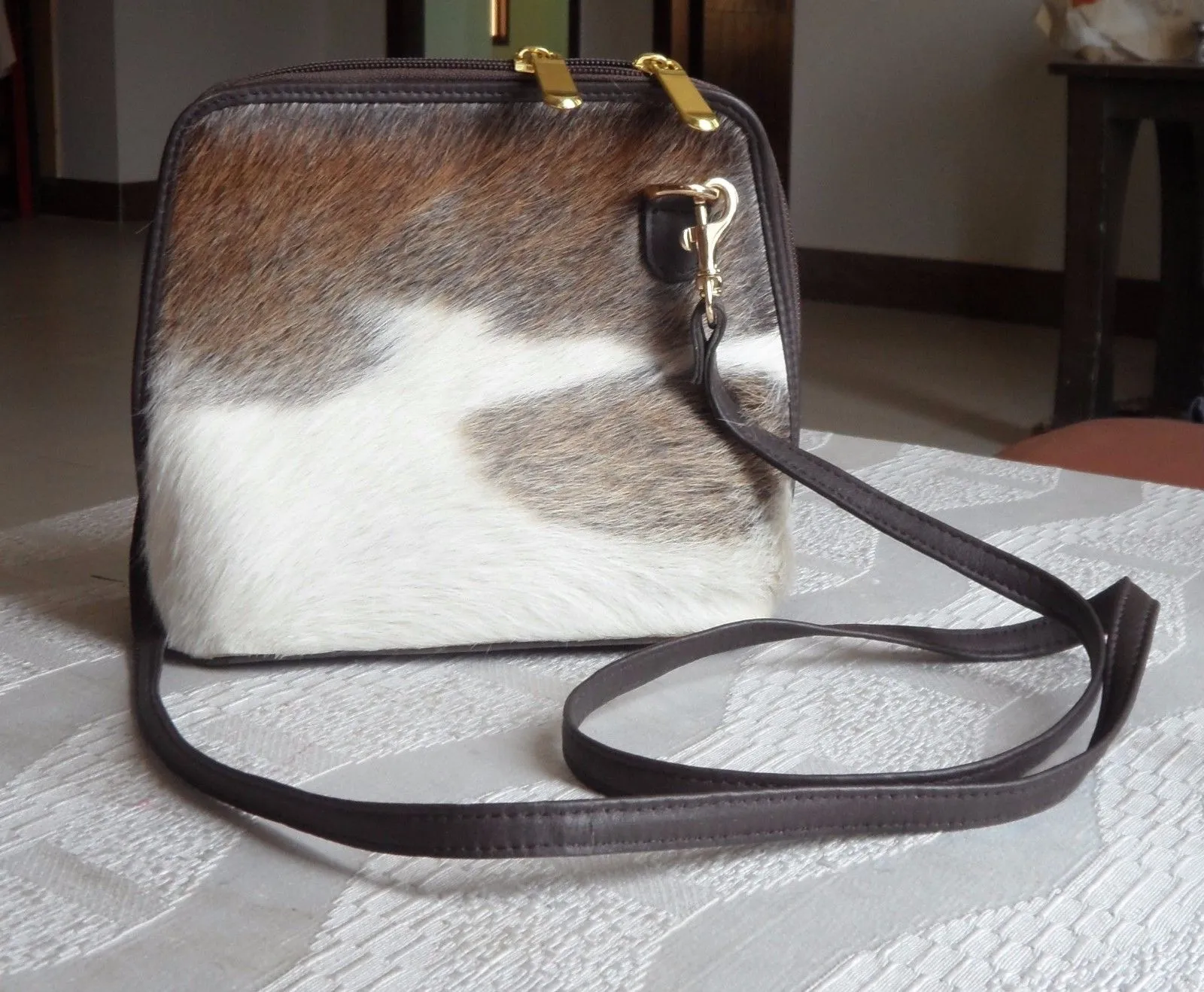 Cowhide sling shoulder purse